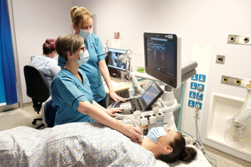 Ultrasound being performed